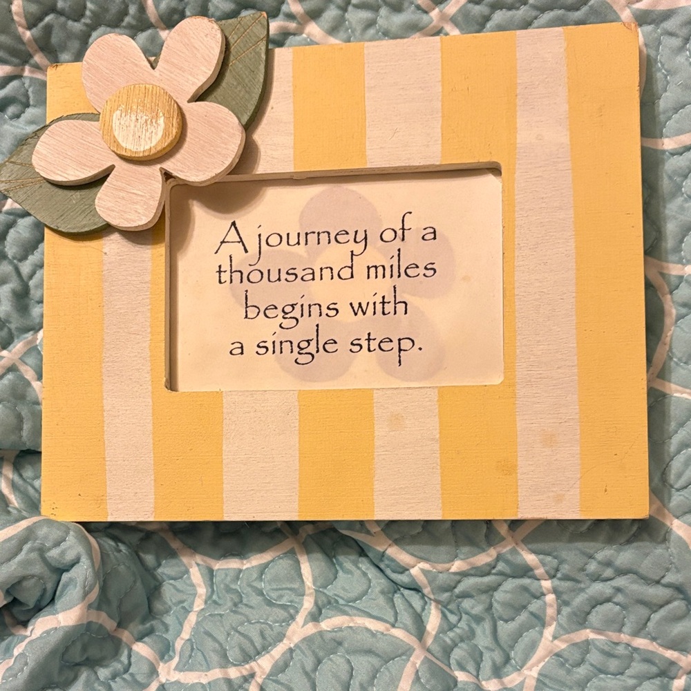 Charming Yellow and White Striped Picture Frame with Floral Accent